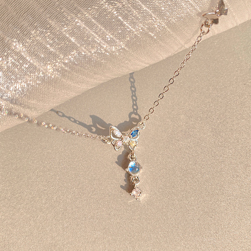 Korean-style ethereal crystal diamond butterfly necklace for women—sophisticated, niche, sweet, with moonstone accents and a trendy fringed design that’s Instagram-worthy.