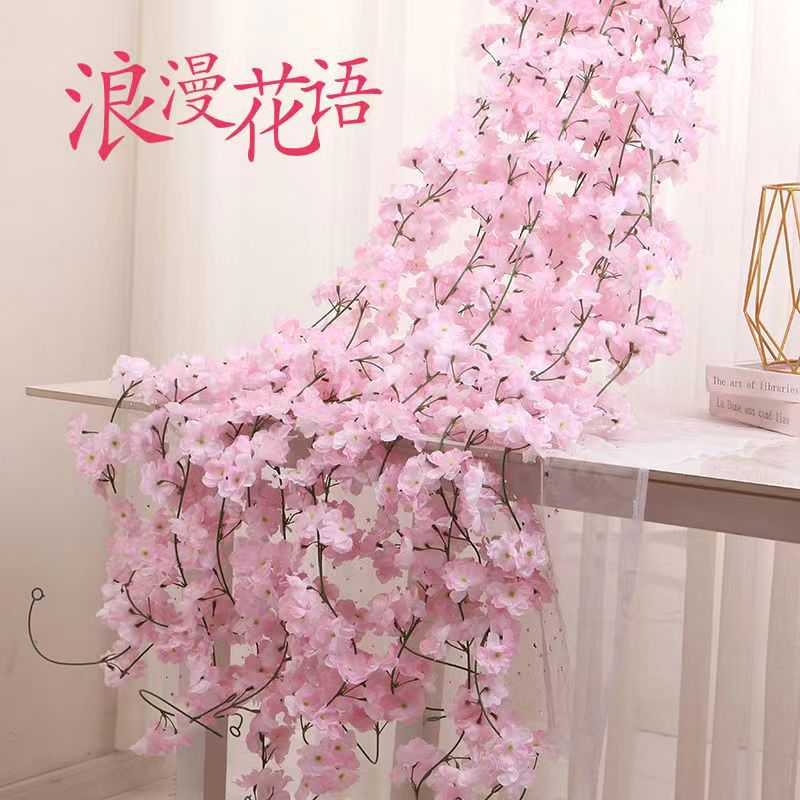 Simulated cherry blossom rattan wrapped around air conditioning pipes, vine strips, plastic artificial flower rattan, decorative flower rattan wholesale