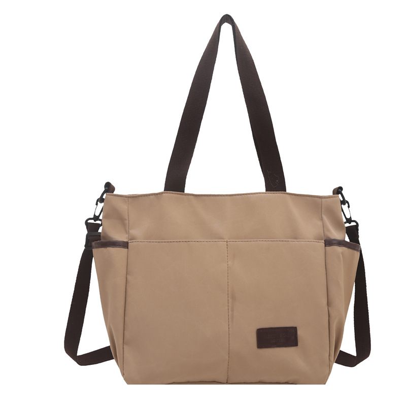 Bolso de lona coreano para mujeres nueva moda ocio de gran capacidad mochila portátil tote simple bolso de hombro para estudiantes