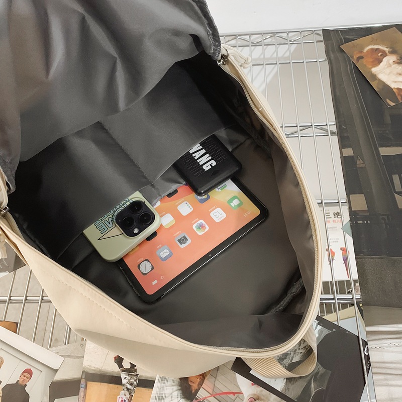 Mochila escolar para mujer nueva mochila de nailon ligera de gran capacidad para hombre estilo universitario estudiante de secundaria y preparatoria viaje mochila para computadora