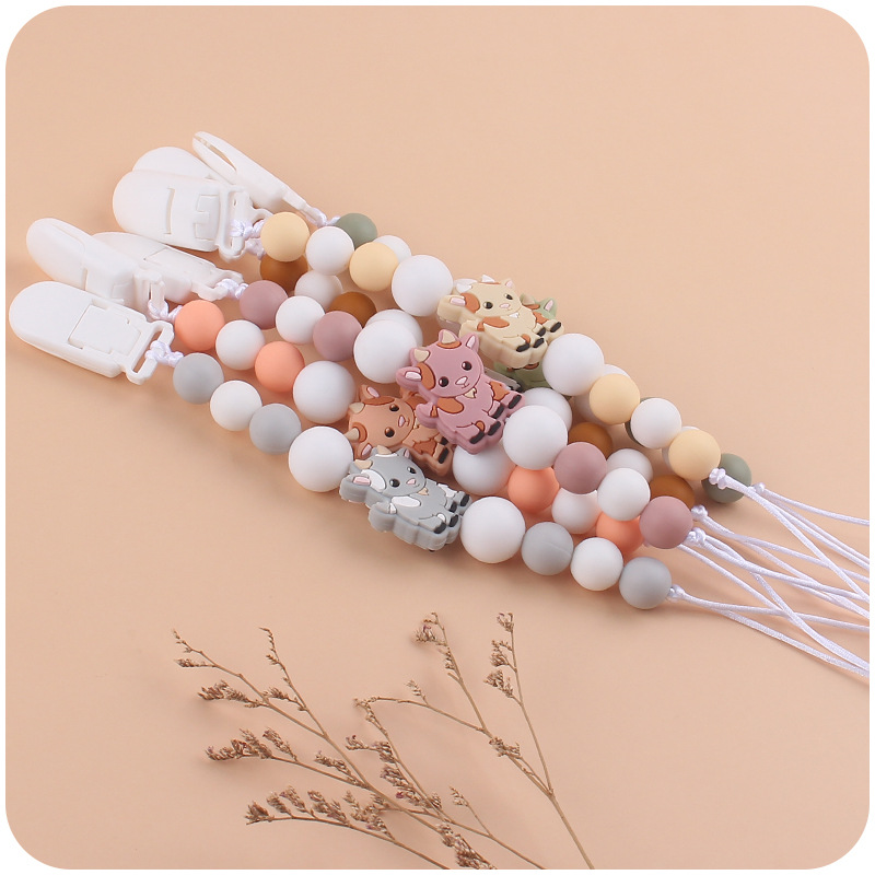 Nuevo bebé suministros chupete cadena creativa de dibujos animados Cordero silicona bebé mordedura cadena anti-gota molar