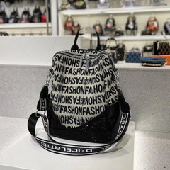 女性用ファッショナブルなキャンバスバックパック 2025 新しいトレンディな刺繍入りホットダイヤモンド通勤バックパック、ハイエンドのニッチトラベルバッグ
