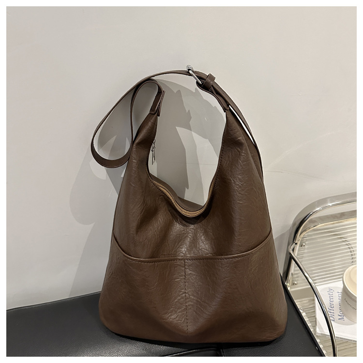 Bolso de hombro tote retro y espacioso para mujer con dos bolsillos, nuevo modelo de ocio minimalista para 2025.