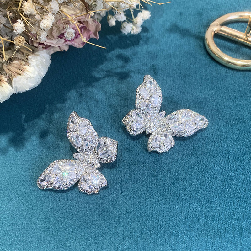 Fashion White Butterfly Copper Zircon Earrings Wholesale display picture 4