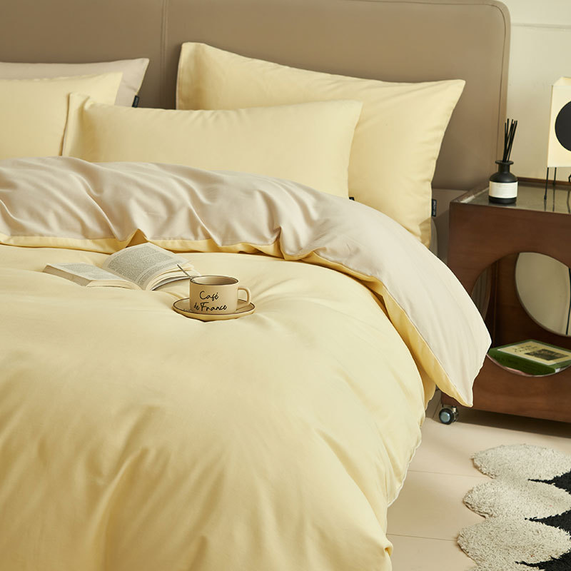A clase de algodón ligero de lujo cama de cuatro piezas set2025 nuevo algodón colcha cubierta sábanas de cama de tres piezas set estudiantes