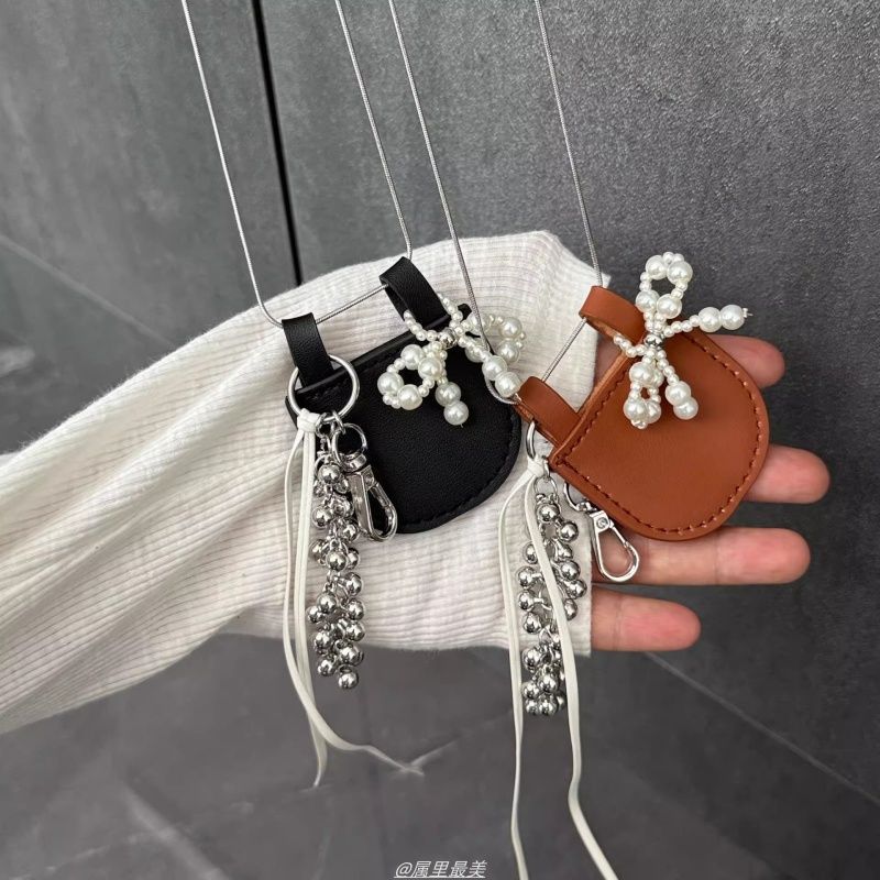 ニッチデザインレザーバッグパールリボンロングセーターチェーン甘くてクールな個性インバッグハンギングアクセサリー女性用|undefined