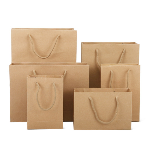 Thickened primary color single-sided kraft paper hand carry bag wholesale clothing packaging bag printed logo shopping bag