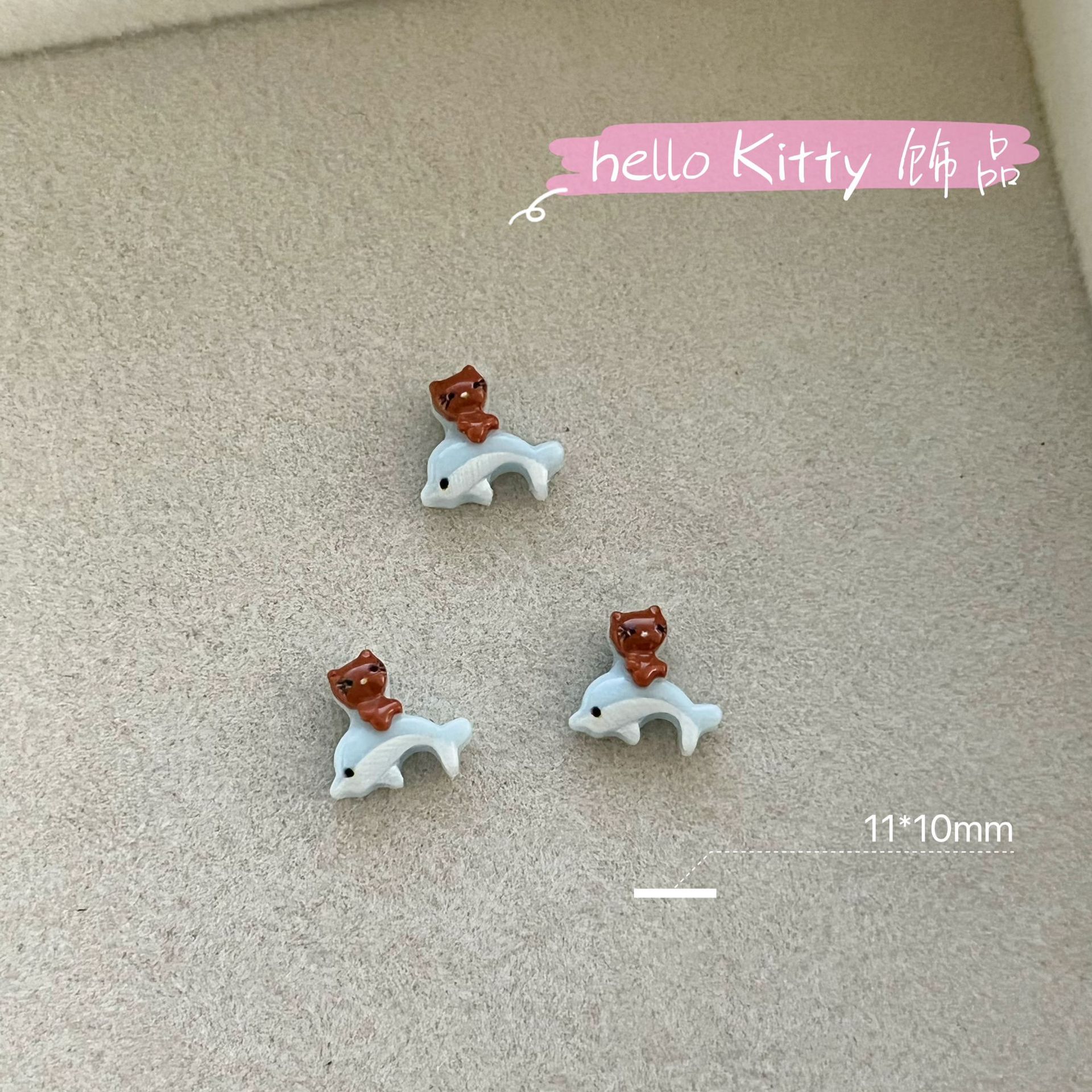 新商品のキティキャットの三麗鴎のネイルアクセサリーのネットの赤い爆発の樹脂のかわいいkt猫は甲を着て飾ります。