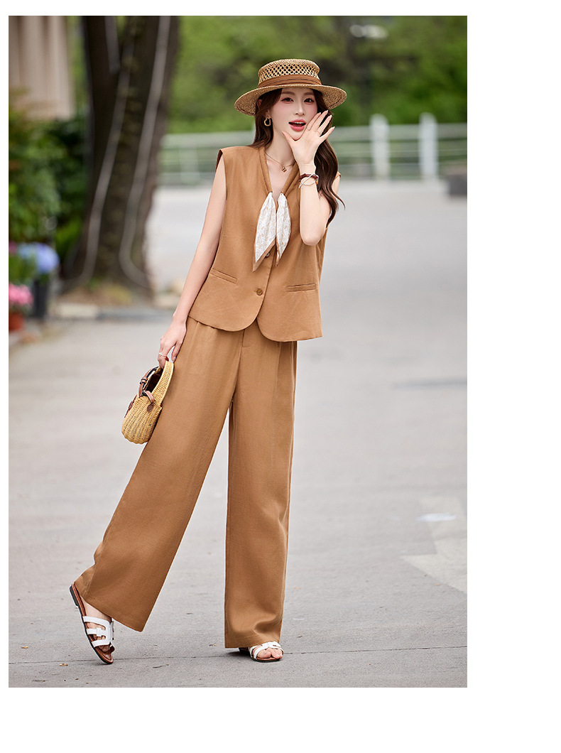 Bộ vest nữ gồm áo gile và quần tây ống đứng cạp cao — màu đen, màu cam, màu trắng ngà chi tiết 12