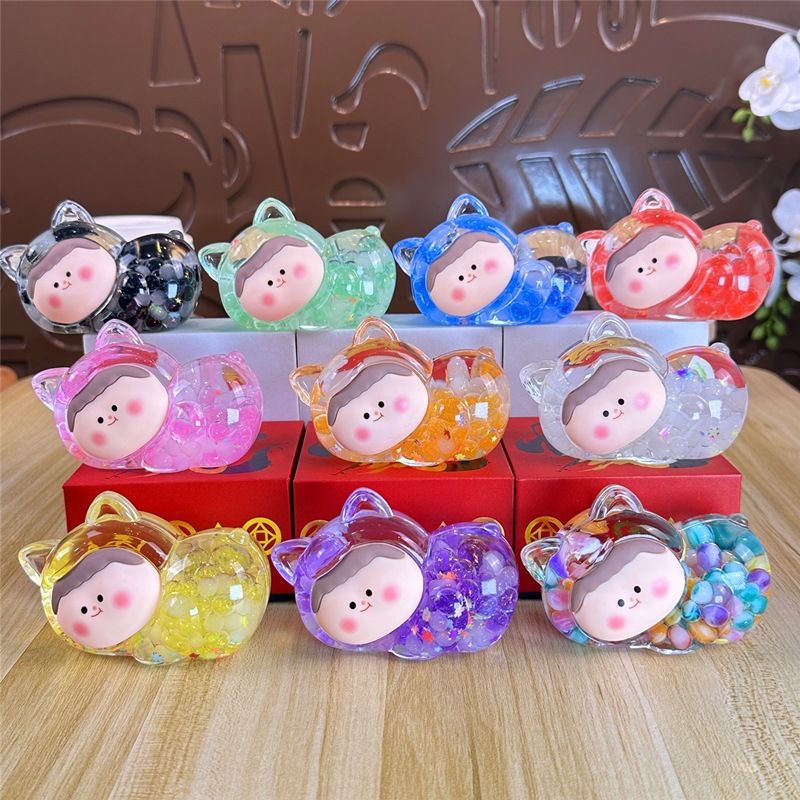 Nocturno explosivo gato macarón super lindo dibujos animados arena flotante en aceite caja ciega pequeña bolsa ciega adornos al por mayor