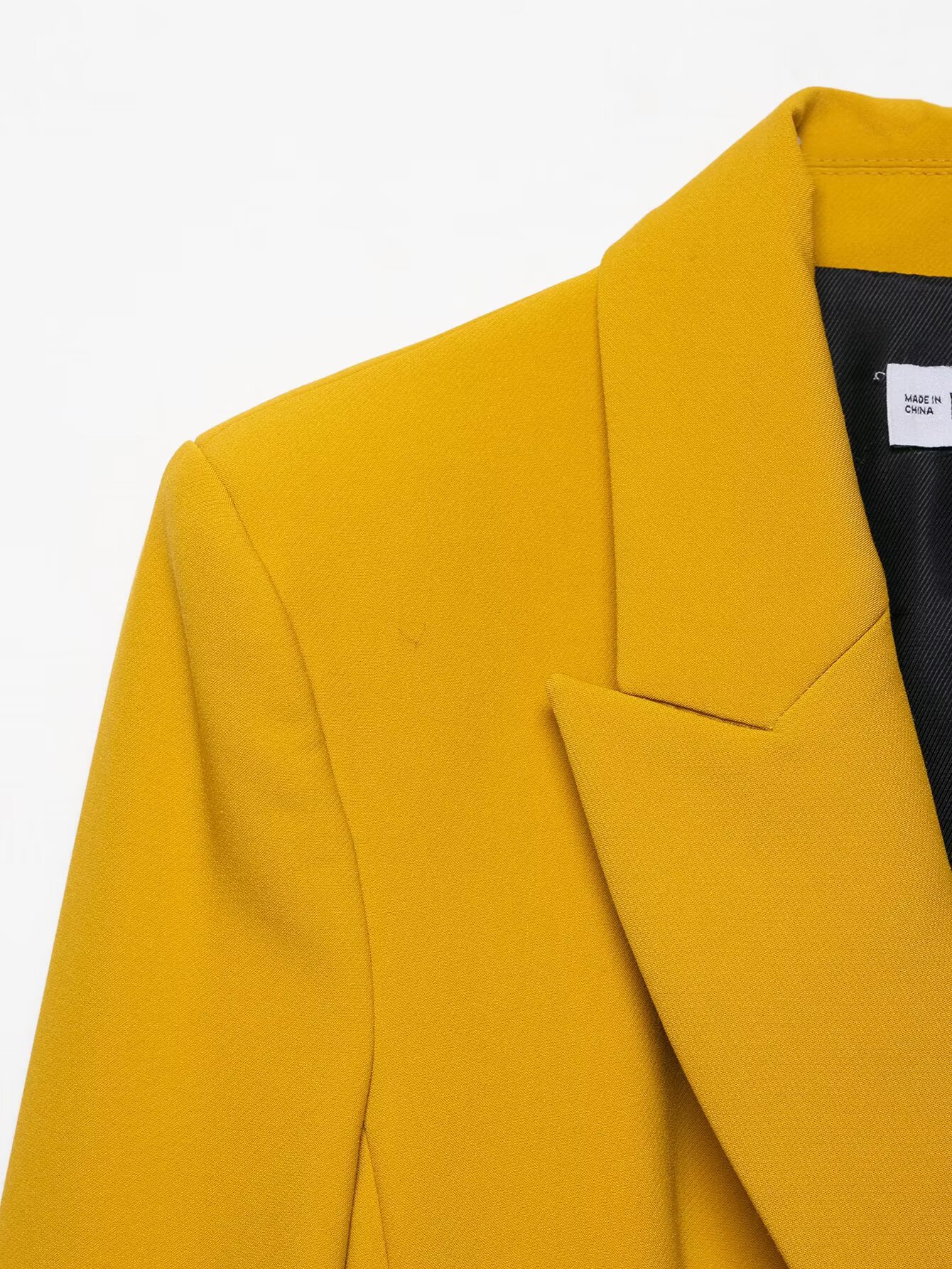 Dames broekpak met blazer met schoudervullingen en hoge taille_voghion.com