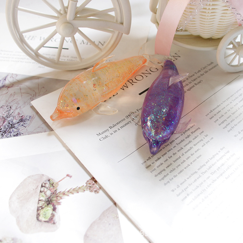 Ventas transfronterizas calientes de malta de delfines pellizco de compresión juguetes de alivio de la emoción artefactos mágicos regalos para niños al por mayor