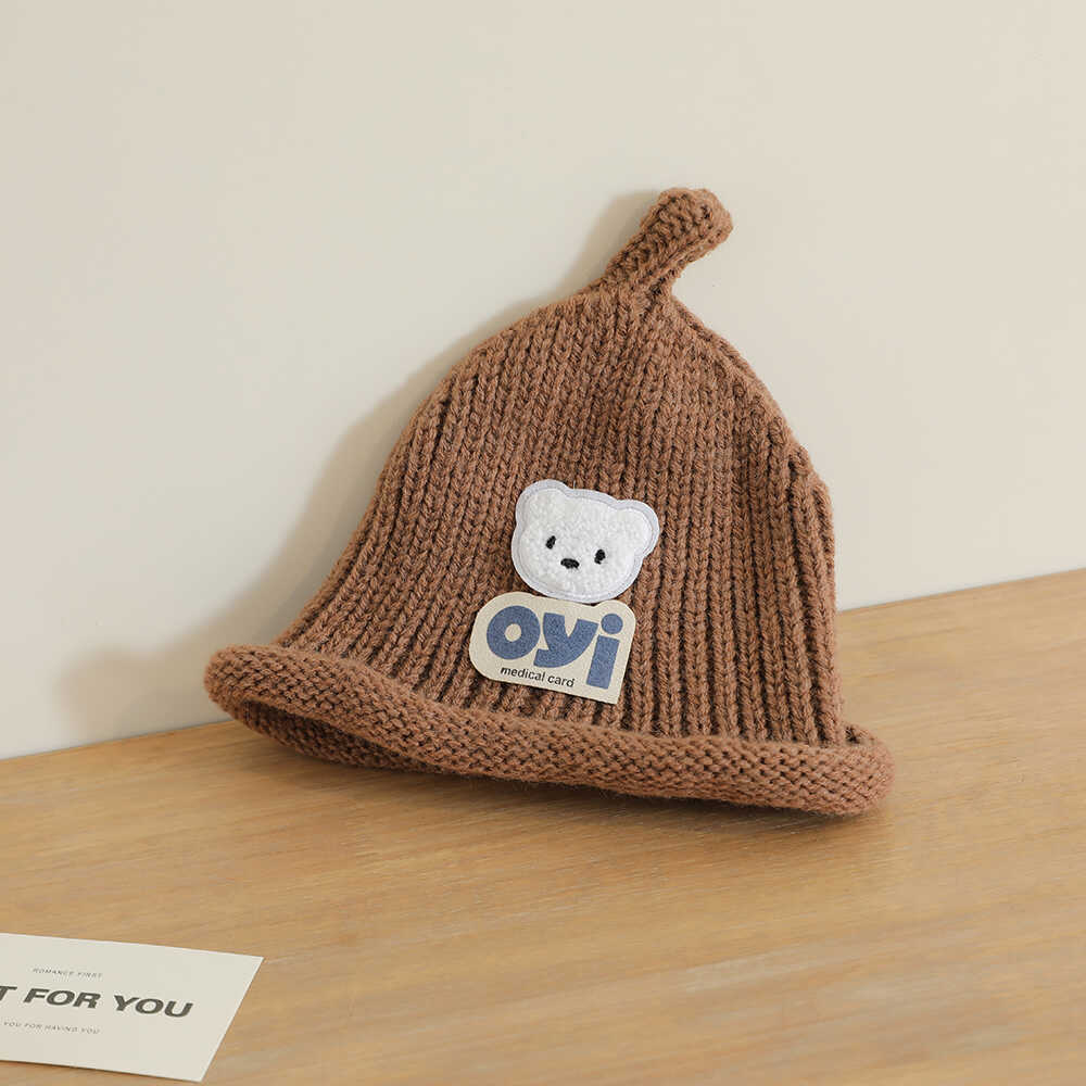 2024 otoño y invierno nuevo unisex lindo sombrero de punto de cabeza de oso simple sombrero de lana casual universal