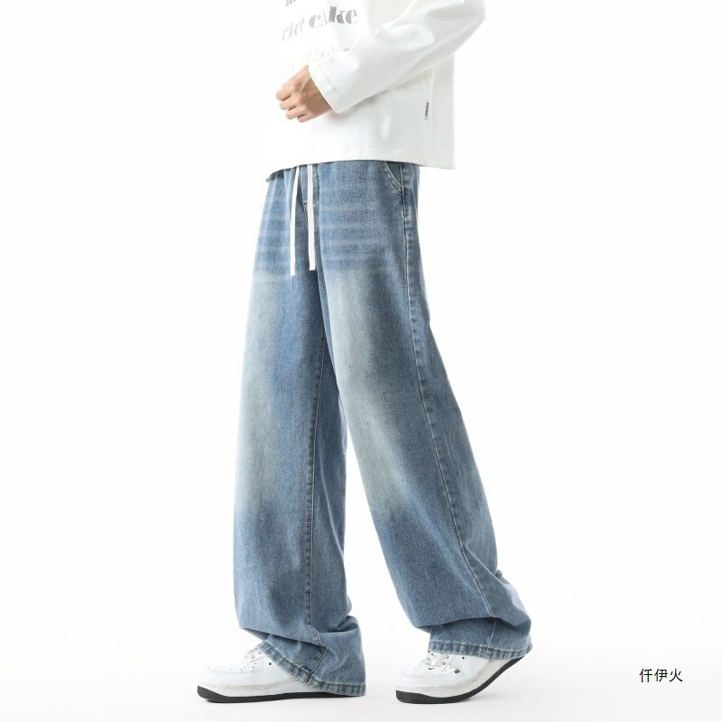 American retro-style long wide-leg jeans for men, with drawstring, loose fit, gradient color, floor-length, distressed finish, casual style, and plus-size options, offering a good drape