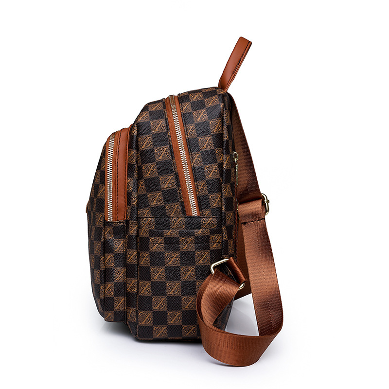 Spot al por mayor 2023 invierno nuevas señoras retro PU mochila de viaje de color de contraste de moda mochila escolar