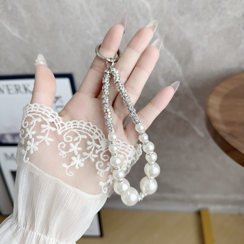 Ins Advanced Sense Super Flash Teléfono móvil Perlas de diamantes Adornos para teléfonos móviles Cadena anti-pérdida de todo fósforo Cadena para teléfonos móviles con lazo