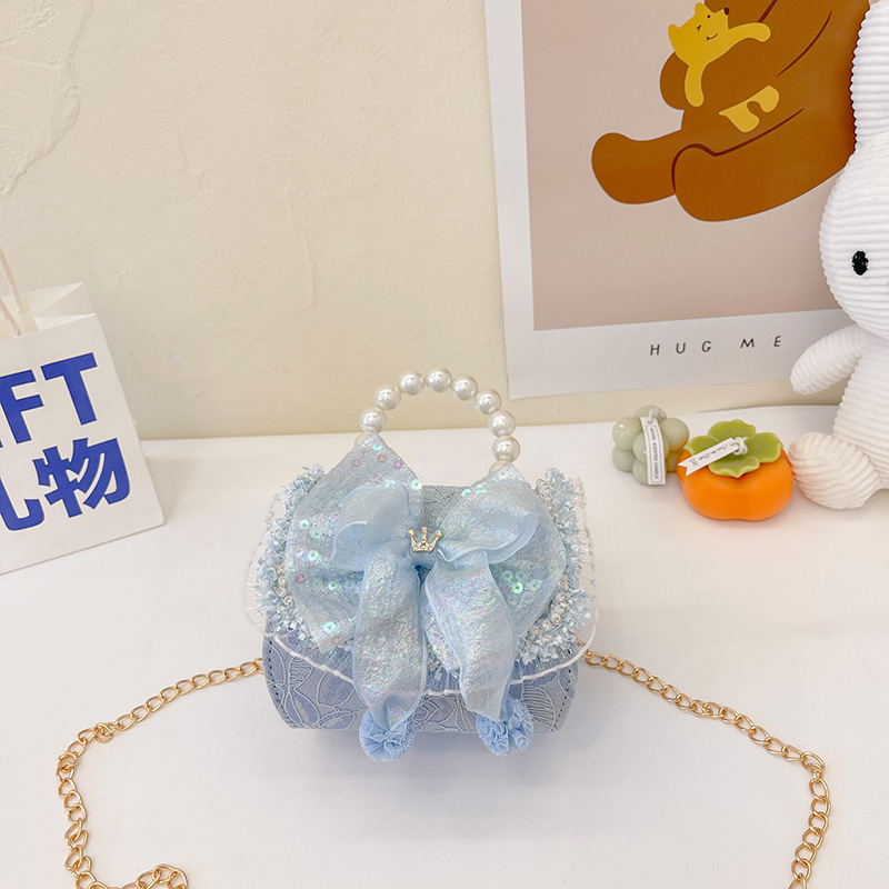 Bolso infantil de perlas 2024 nueva chica arco de moda, bolsa de tramo inclinada, princesa de moda, accesorios de algodón y lino, bolso