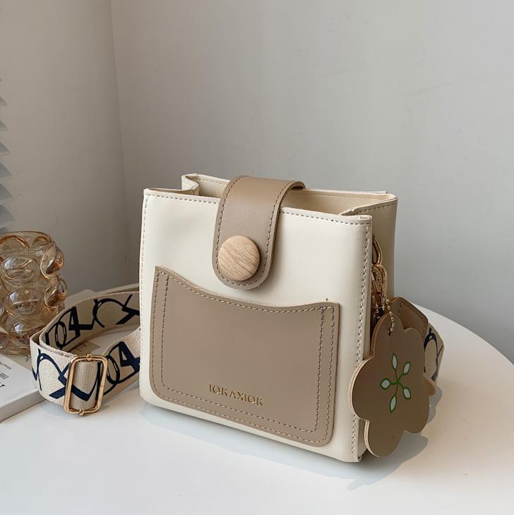 Bolsa de comercio exterior para mujeres 2025 nueva versión coreana universal nicho bolso de cubo de alta calidad sensación extranjera bolso de hombro único