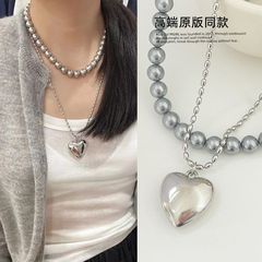 2024年ins韓シンプル大桃心畳は鎖骨鎖金属愛ネックレス女性の銀色長版を装着した