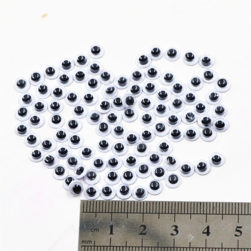 Venta directa de fábrica actividad de la banda de ojos adhesivo al por mayor DIY accesorios de juguete negro y blanco color pestañas animal bead pegatinas
