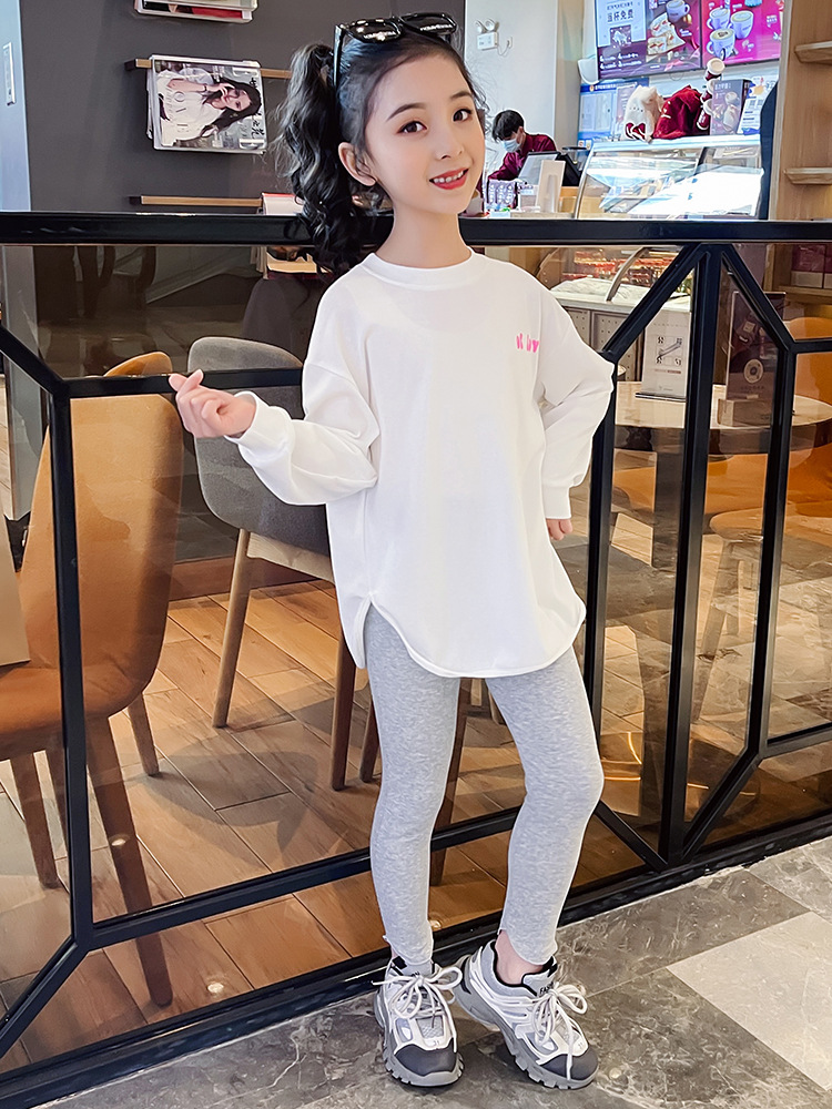 Polainas de las niñas de primavera y otoño nuevas niñas medias y grandes niños pantalones de todo fósforo ropa exterior de moda Pantalones de los niños de moda