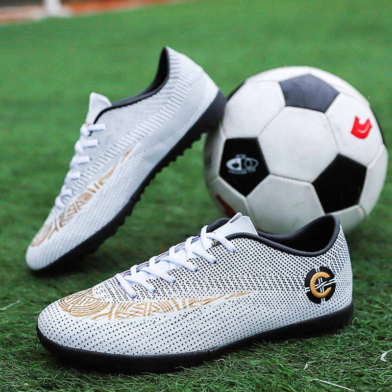 Fotbollsskor professionella med dobbar för gräsplan_voghion.com