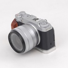 1个 颜色：银色 材质：木质 适用于富士XM5实木手柄，轻量化设计