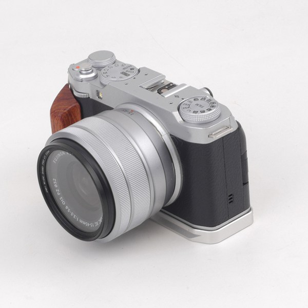 1个 颜色：银色 材质：木质 适用于富士XM5实木手柄，轻量化设计