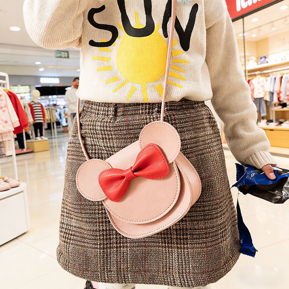 Bolso bandolera pequeño rosa con lazo para niñas, estilo coreano, estilo ins, venta al por mayor del fabricante, mini bolso creativo de dibujos animados.