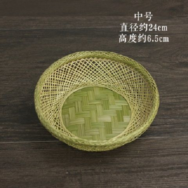 手作りの竹の編み製品の小さい竹のかごの丸い棚は箕のホテルのレストランの間食の果物のお菓子の皿のマントーのかごを振りかけます。|undefined