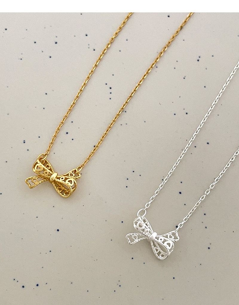 Collana con fiocco cavo da donna, design di nicchia di lusso leggero, cravatta a nastro d'amore, catena di clavicole, collana regalo in acciaio al titanio_voghion.com