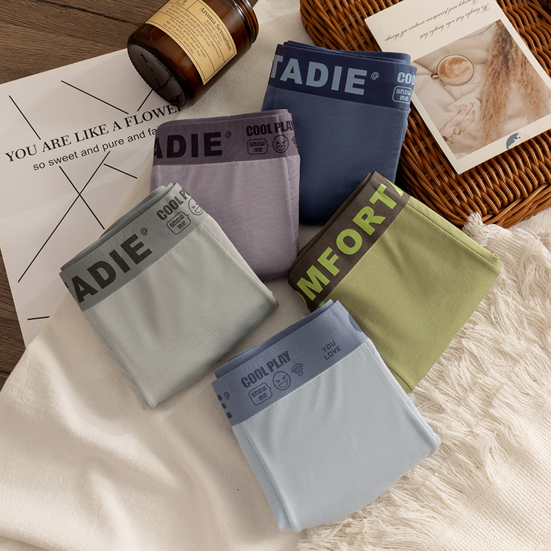 Hombre de alta gama algodón sin marcas pantalones interiores antibacterianos transpirables algodón entrepierna primavera y verano tendencia delgada juventud pantalones cortos de cuatro cuernos para chicos