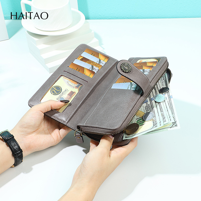 2025 nueva moda retro simple billetera larga de cuero graso para mujer bolso de mano multifuncional de gran capacidad