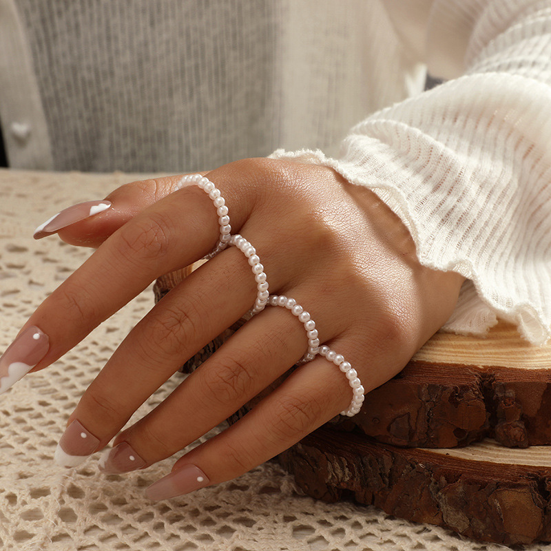 Simple Retro Imitation Pearl Original Design Opening 4-piece Set European And American New Fashionable Fresh Temperament Knuckle Ring display picture 4