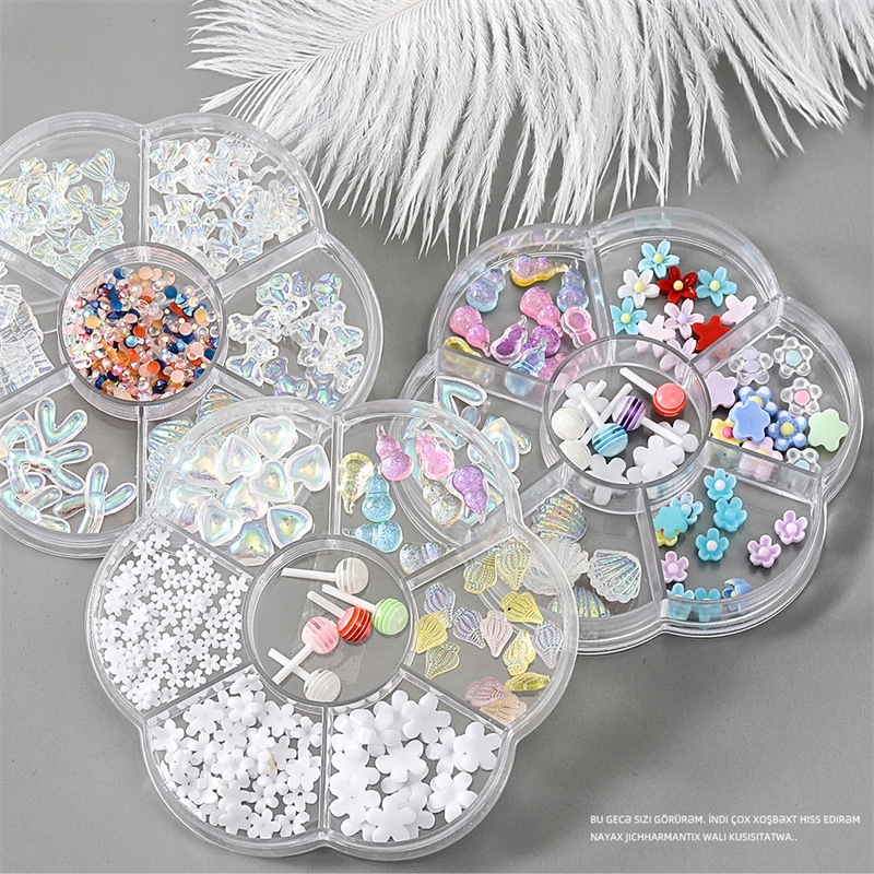 Venta al por mayor joyería de uñas arco Aurora oso mariposa rhinestone perla mixta conjunto caja decoración de uñas accesorios de diamantes