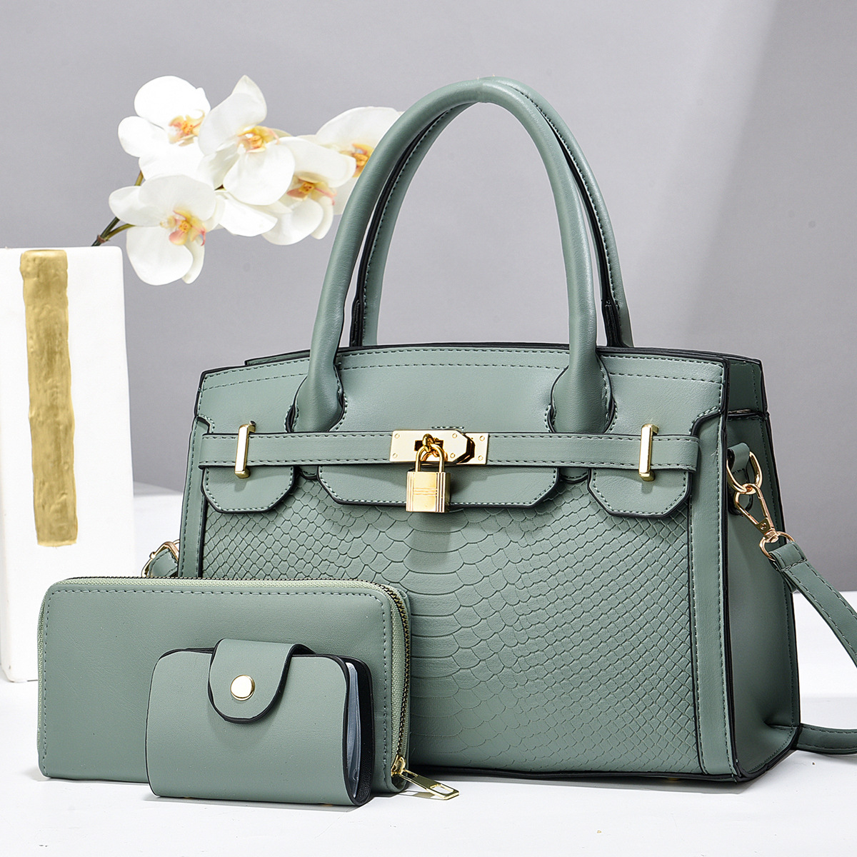 Taizhou bolsos de mujer bolsos grandes bolsos de tres piezas bolsos de cerradura colgante bolsos de comercio exterior