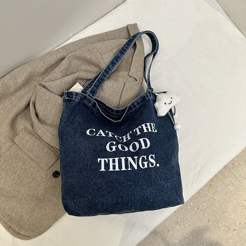 Bolsa de denim casual de gran capacidad para mujeres 2024 nueva bolsa de hombro de viaje, bolsa universitaria ligera y versátil