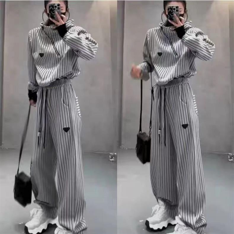 001 2024 Spring Autumn New Fashion Loose Slimming Striped Hooded Sweatshirt And Long Pants Two-Piece Set For Women_voghion.com