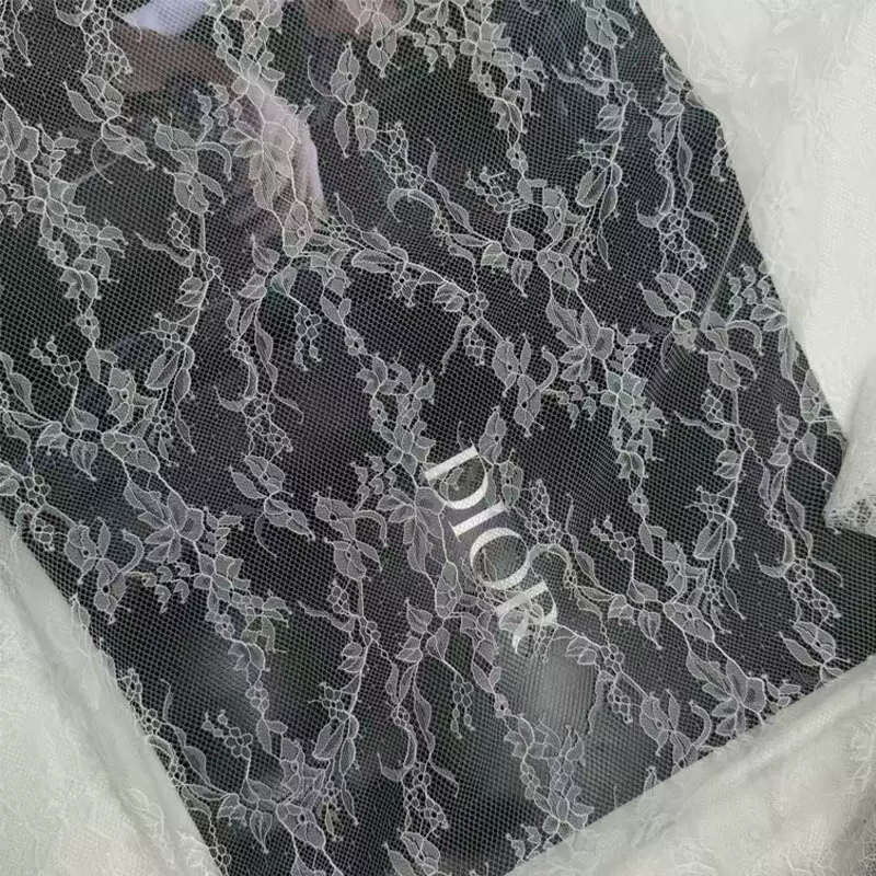 定制白色蕾丝面料 柔软舒适剪线蕾丝布 内衣婚纱装饰亮丝蕾丝布料