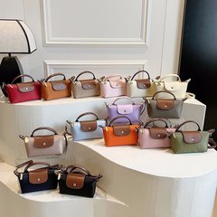 おしゃれなミニバッグ レディース 春の人気ハンドバッグ トレンド シンプル 餃子バッグ 多用途 ショルダーバッグ クロスボディバッグ