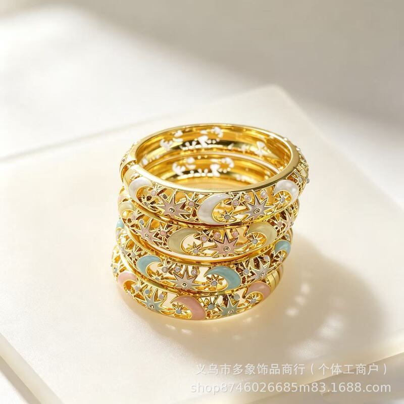 Factory direct supply of star and moon hollow enamel bracelets, macaron multi-color oil-drip open bangles, 2026 new model wholesale Factory direct supply of star and moon hollow enamel bracelets, macaron multi-color oil-drip open bangles, 2026 new model wholesale