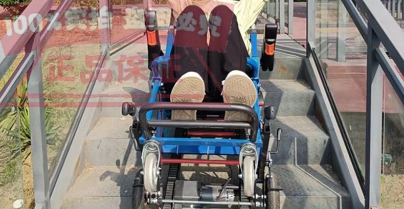 Rubber-tracked electric stair-climbing chair for paralyzed elderly people to move up and down stairs