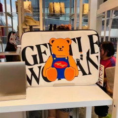 新型2023年タイのファッションブランドのキャンバスバッグの女性のハンドバッグのファッション漫画のタブレットのノートパソコンのカバンのバッチ
