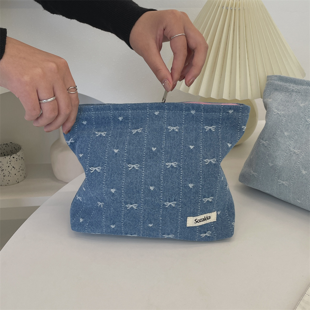416g Weight Canvas Lining Material Zipper Closure Type / Strap Type Cosmetic Bag Bags Type Holiday, Travel, Daily Occasion Denim Material Bag, Cattle, Knot, Butterfly, Bow Knot Pattern All Seasons Season Women's Gender Cute Style Square Shape Cute Bag Cattle Knot Denim Square Makeup Bags 8