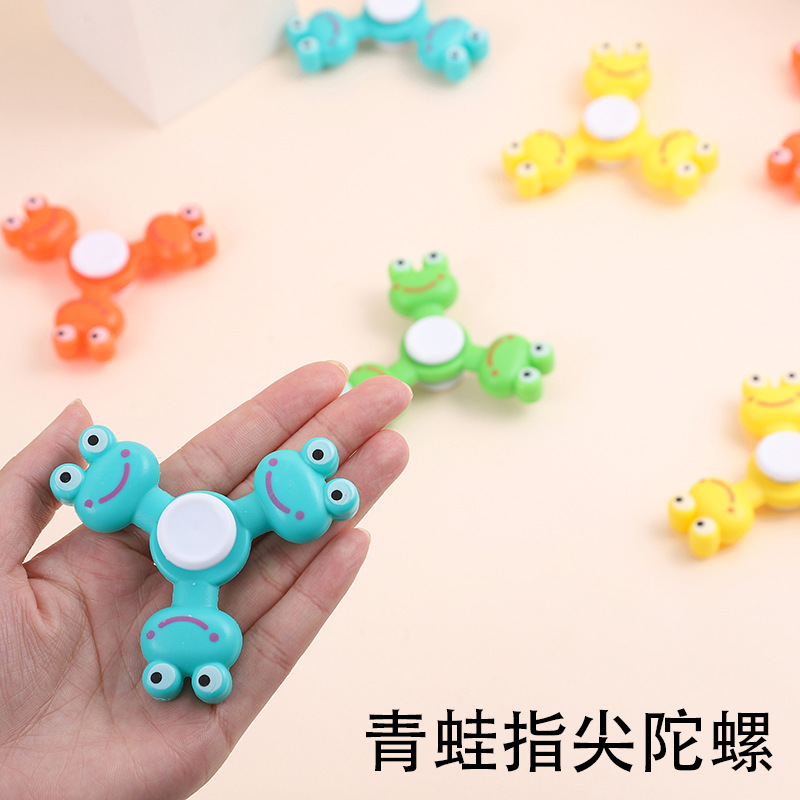 Cadena transfronteriza punta de dedo giroscopio estand rotatorio de descompresión de regalo de jardín de infantes azúcar juguetes descompresivos al por mayor