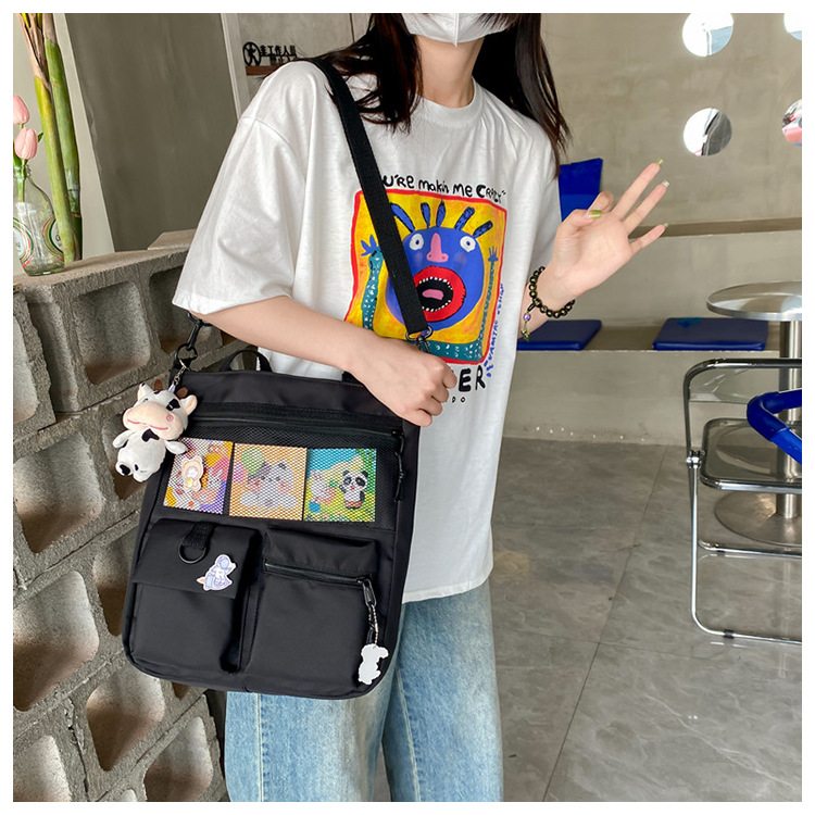 Large-capacity Japanese-style single-shoulder canvas bag for girls, versatile crossbody, ins, a tote bag for junior high school students' classes, and a schoolbag for after-school tutoring undefined