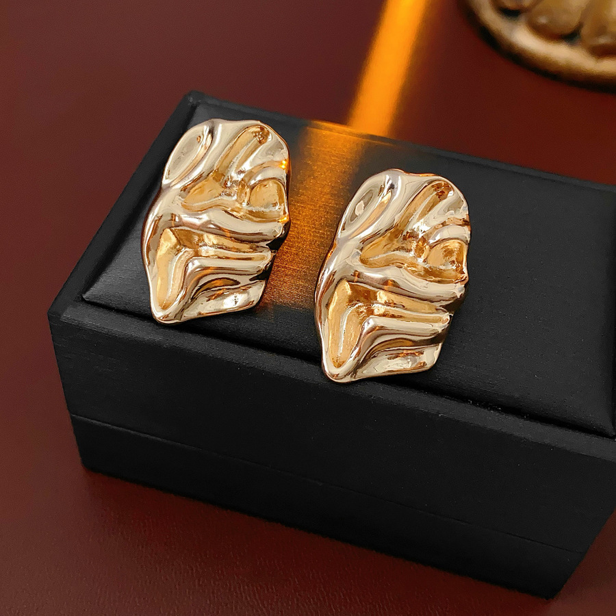 Aguja de plata MEDIADOS DE-antigua flor redonda borla pendientes de metal retro europeo y americano elegante luz pendientes de lujo al por mayor para las mujeres