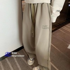 即墨原工場のad衛ズボンの女性秋冬のゆったりとした純綿の垂れ下がった感じの純綿のストレートズボンの広い足のひものカジュアルなズボン