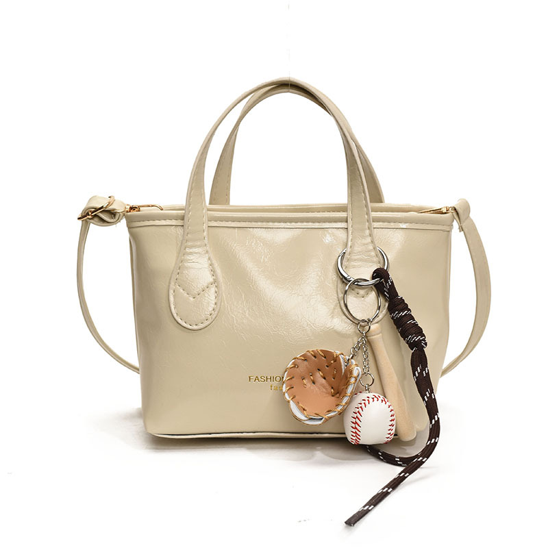 Bolso de cubo de textura de color sólido para mujer 2025 primavera nueva moda bolso de mensajero coreano estilo occidental de alta gama para mujer