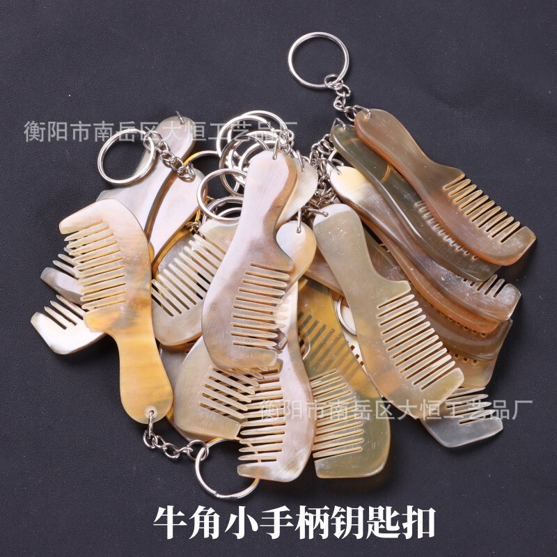 露店の多いデザインの彫刻動物の小さいペンダントのステンレスのキーホルダーの牛の角のキーホルダーの小さい贈り物の卸売り|undefined